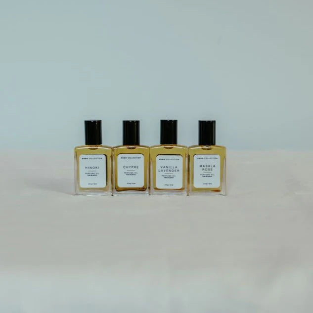 Row of perfume oil fragrances, Hinoki, Chypre, Vanilla Lavender and Masala Rose. | Elizabeth Homestead